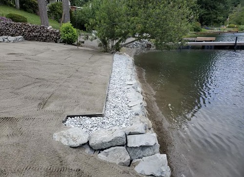 Side View of lake house rockery rock wall