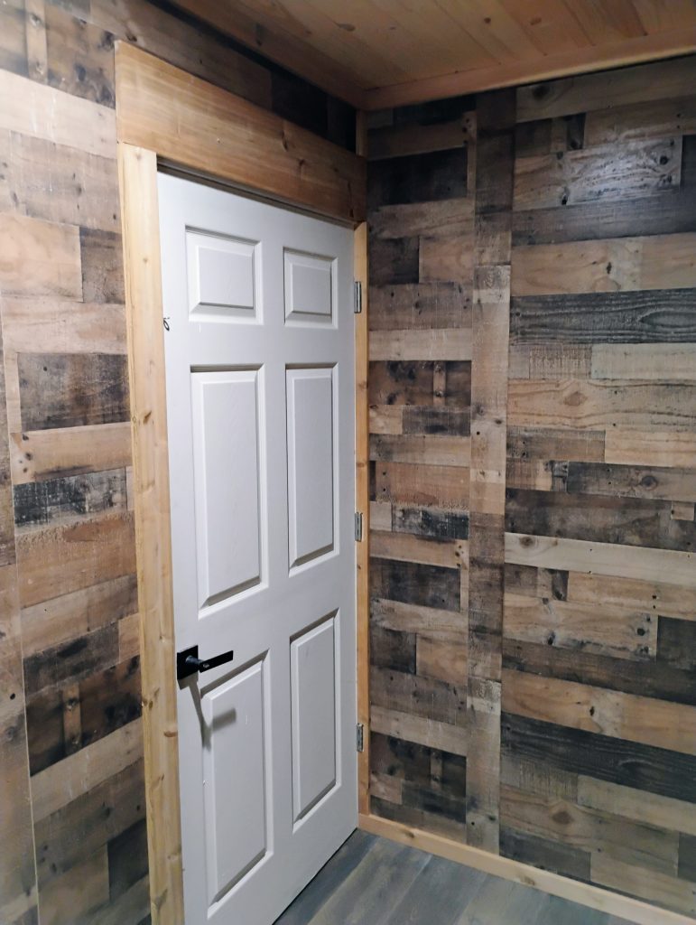 Trim work around door in remodeled mudroom