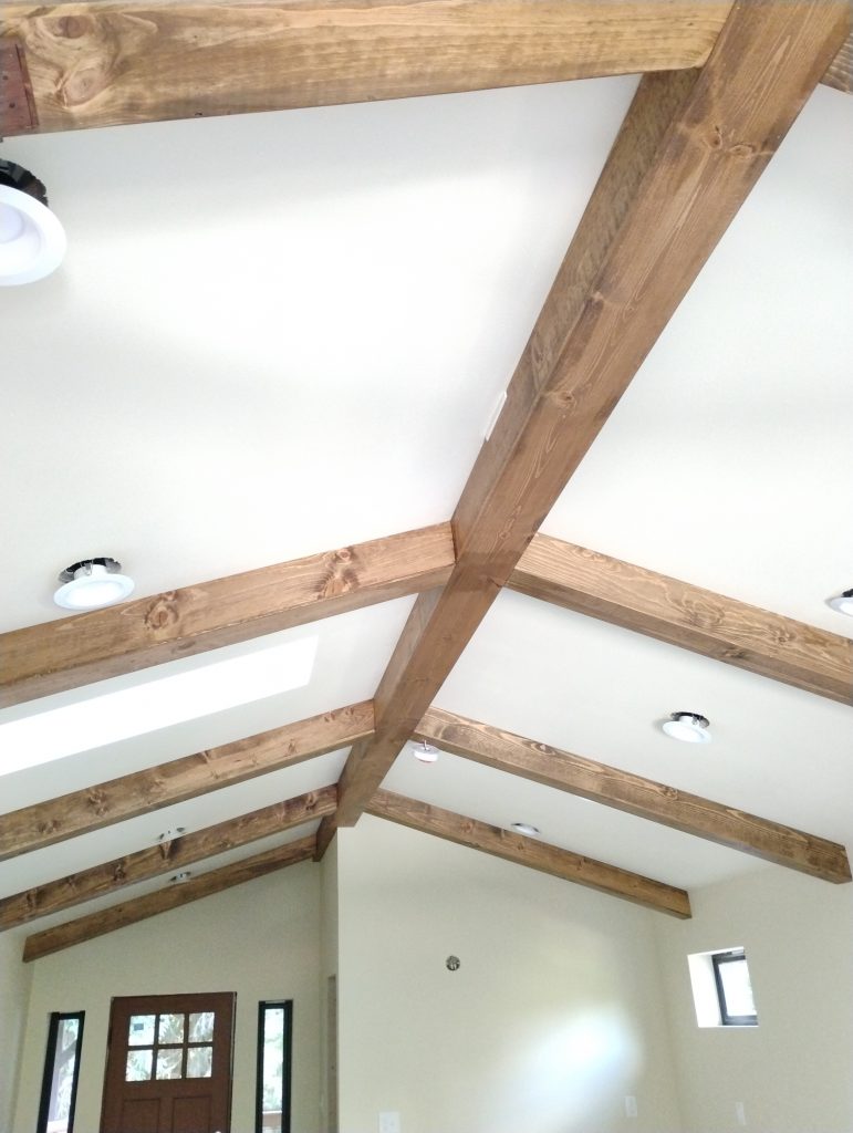 Faux Beams stained and finished and attached to the ceiling