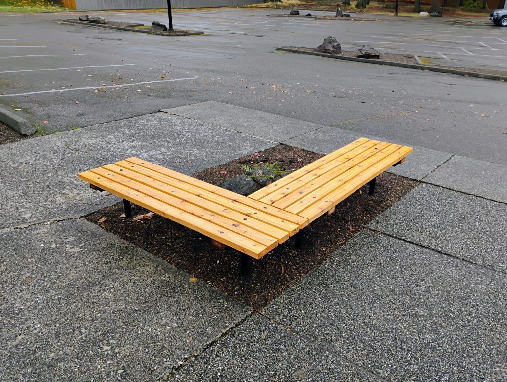 Cedar bench with Staining and finishing installed at a church