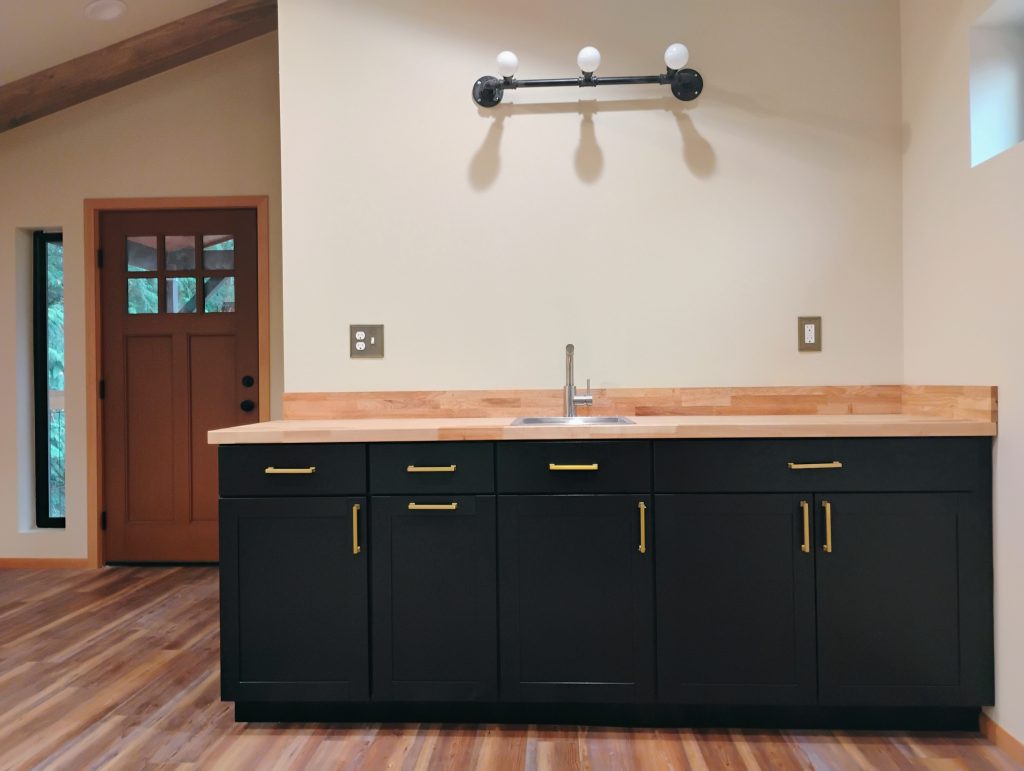 Custom Cabinet Installed with Gold Cabinet Pulls