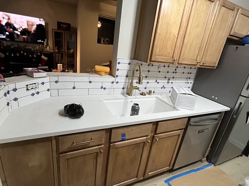 subway tile backsplash installed in a kitchen