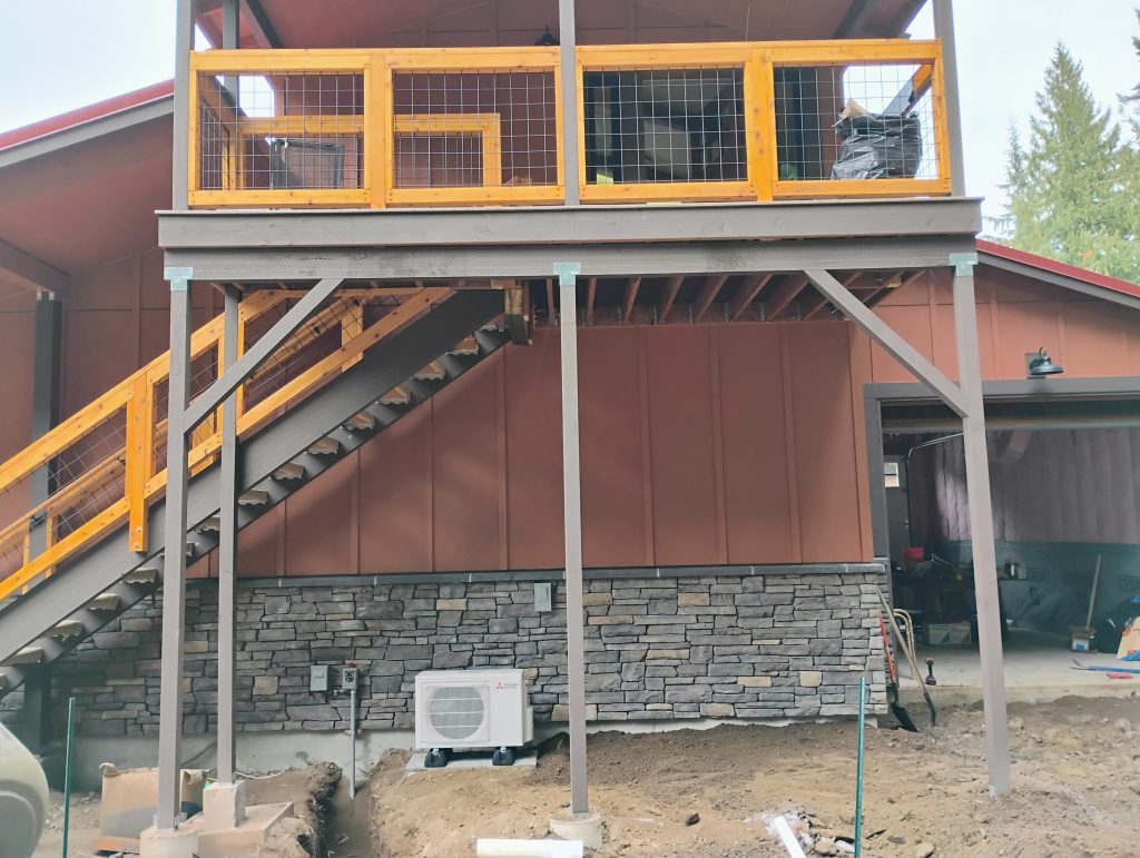 back of ADU showing deck and rails